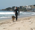 Surfer boy and his dog