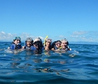 The whole family snorkeling